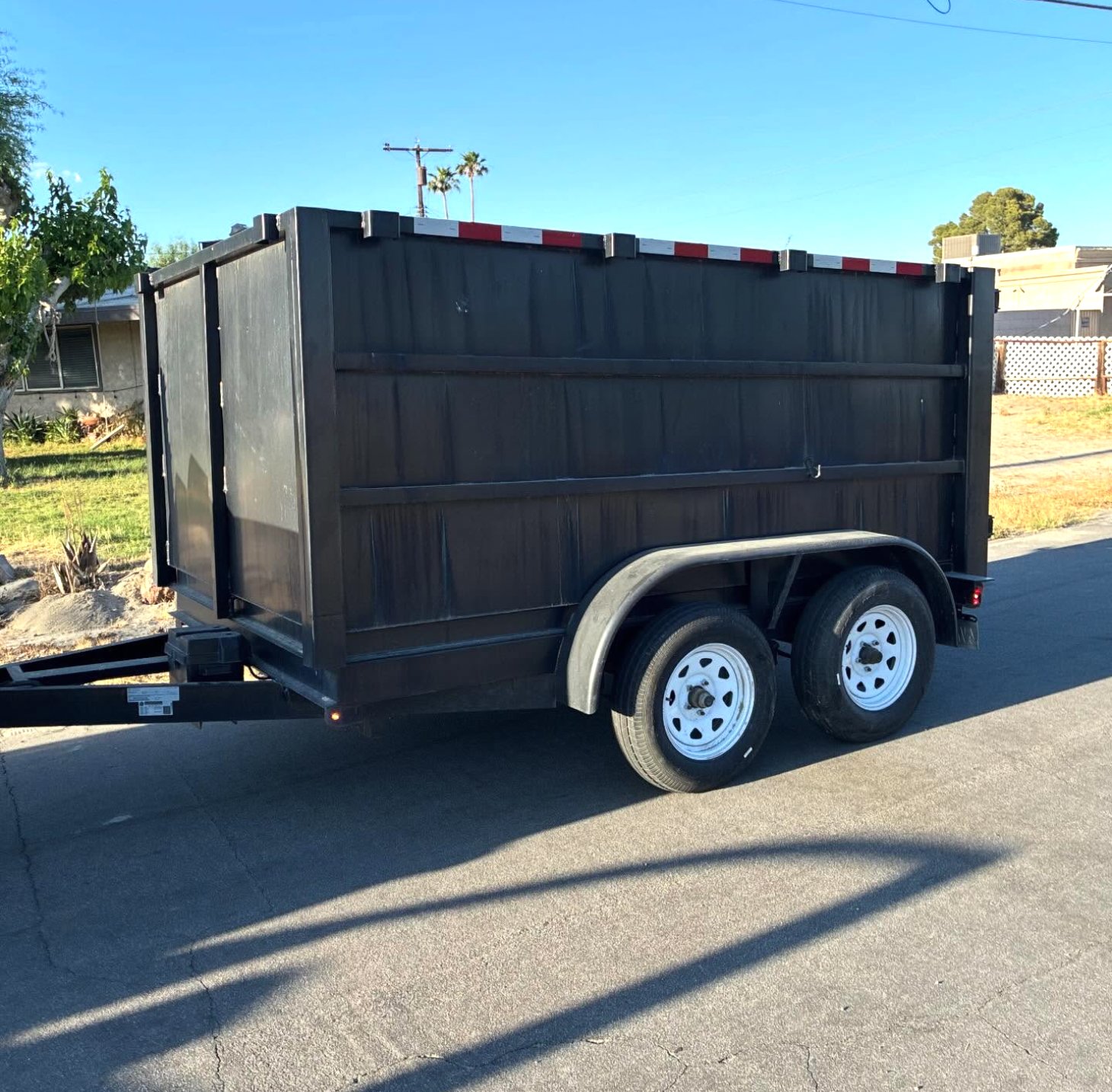 JB Lawn Care 10-yard dump trailer for rent